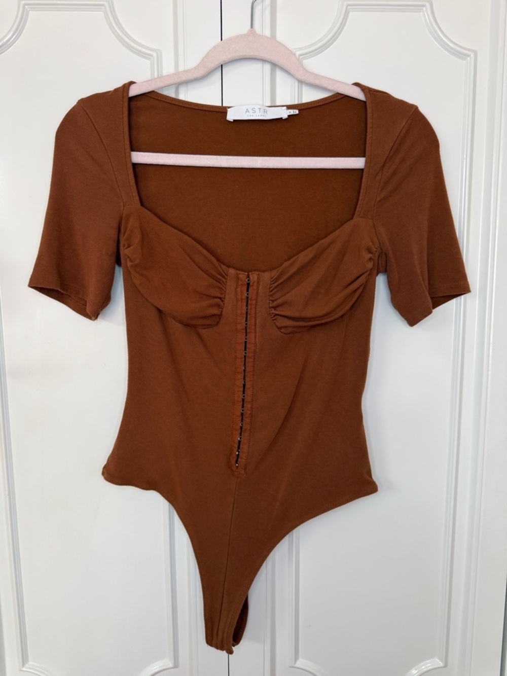 Astr Chest-Button Scoop Neck Bodysuit in Brown